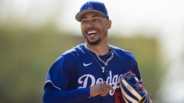 Mookie Betts smiles during a spring training game.